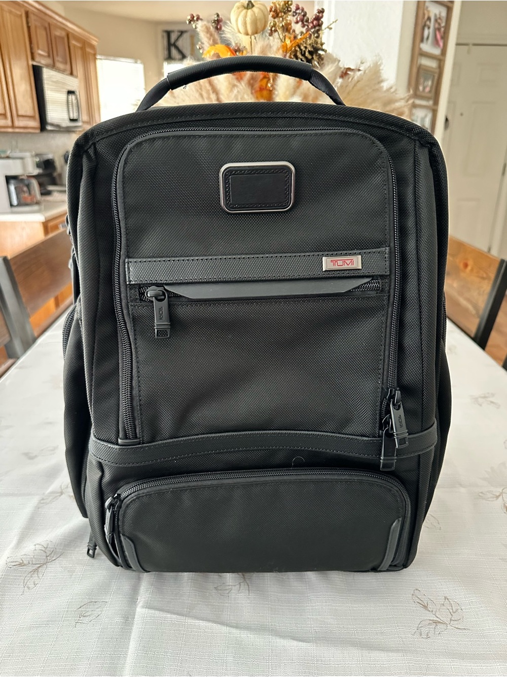 Tumi Black Men's Professional Backpack with Multiple Compartments